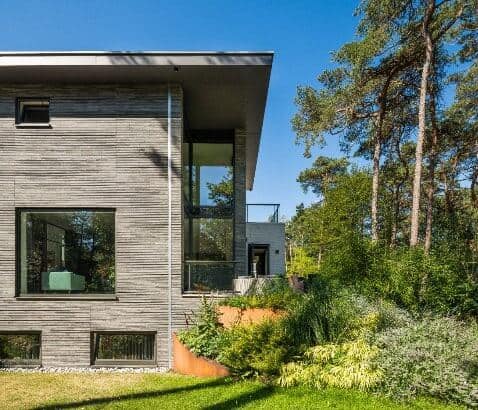 Stan van den Wildenberg ontwerpt bos villa zij aanzicht