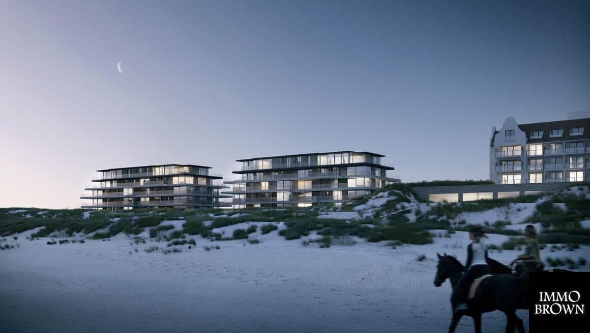 https://www.vandenwildenberg.nl/wp-content/uploads/2019/01/interieurarchitect-Stan-van-den-Wildenberg-ontwerpt-appartement-in-22Blanke-Top22-van-Groep-Versluys-in-Cadzand-zij-aanzicht-bij-avond-van-architect-Govaert-Vanhoutte-BRON-immo-brown-.jpg