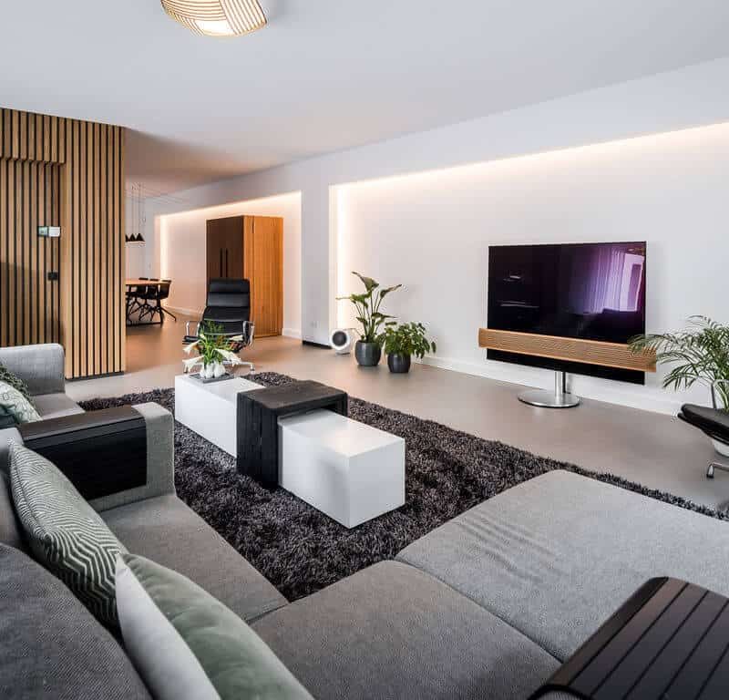 interieurarchitect Stan Wildenberg ontwerp interieur woonkamer living stalen schuifdeuren houten wanden karpet servieskast gietvloer Bang en Olofsen interieurarchitect Stan Wildenberg ontwerp interieur woonkamer living stalen schuifdeuren houten wanden karpet servieskast gietvloer Bang en Olofsen